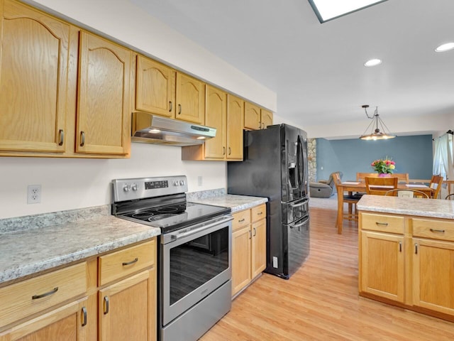 26317 Dukleth Dr, Waterford, WI 53185 - kitchen featuring stainless steel range with electric cooktop, under cabinet range hood, black fridge, light wood-style floors, and light brown cabinetry