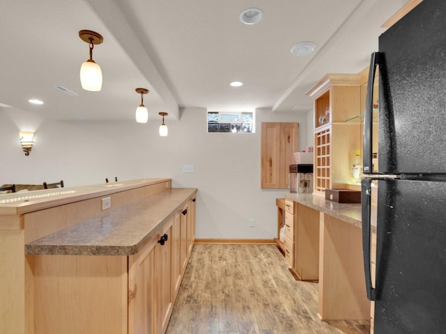 26317 Dukleth Dr, Waterford, WI 53185 - kitchen featuring freestanding refrigerator, light brown cabinetry, light wood-style floors, a peninsula, and recessed lighting