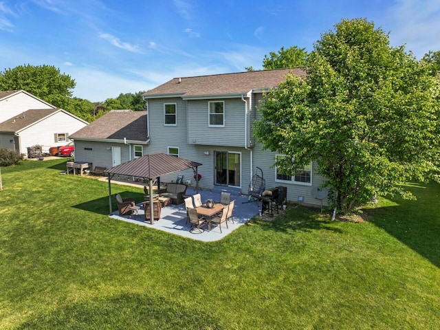 26317 Dukleth Dr, Waterford, WI 53185 - back of house with a patio area, a yard, and roof with shingles