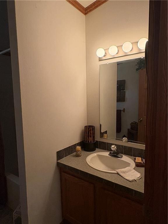 733 W Old Highway 54, Pittsville, WI 54466 - full bathroom featuring vanity, crown molding, and a tub