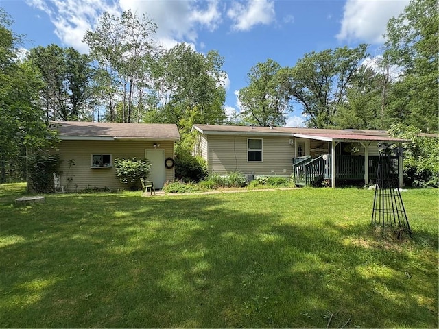 733 W Old Highway 54, Pittsville, WI 54466 - rear view of house featuring a yard