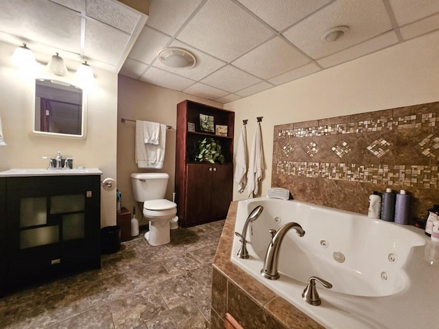 316 S Concord Ave, Marshfield, WI 54449 - full bathroom with a paneled ceiling, a jetted tub, and vanity
