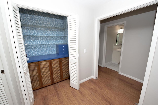 4201 Janick Cir, Stevens Point, WI 54481 - hall featuring wood finished floors and baseboards