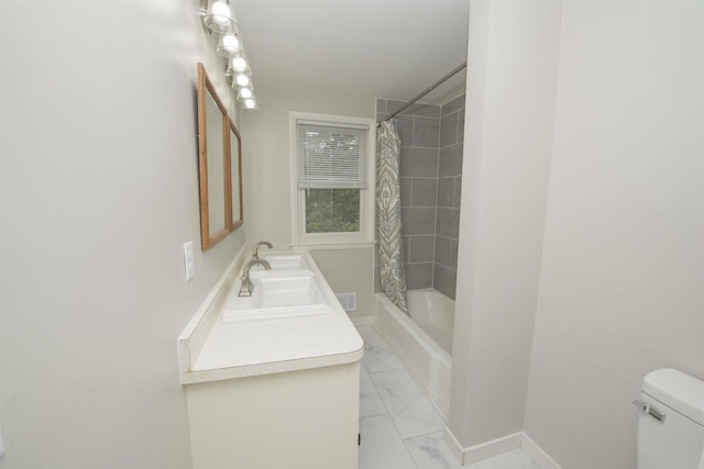 4201 Janick Cir, Stevens Point, WI 54481 - bathroom with vanity, marble look tile flooring, and shower / bath combo