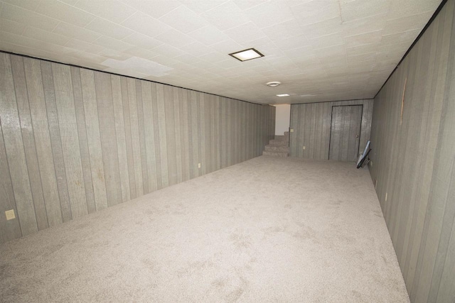 4201 Janick Cir, Stevens Point, WI 54481 - finished below grade area featuring carpet floors, stairway, and wooden walls
