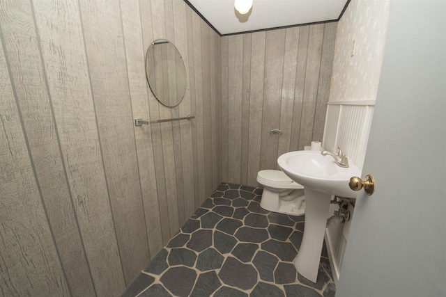 4201 Janick Cir, Stevens Point, WI 54481 - bathroom featuring toilet and wooden walls