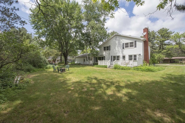 4201 Janick Cir, Stevens Point, WI 54481 - view of green lawn featuring a wooden deck