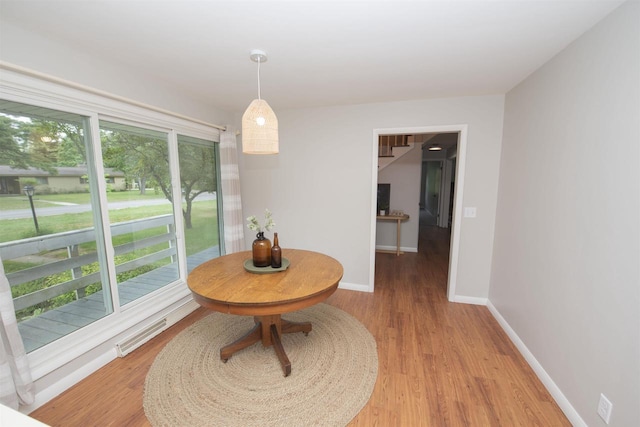 4201 Janick Cir, Stevens Point, WI 54481 - dining room with light wood-type flooring and baseboards