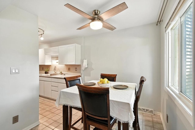 W169N11470 Biscayne Dr Unit 7, Germantown, WI 53022 - dining space with light tile patterned floors and a ceiling fan