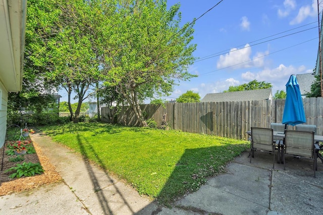 4904 25th Ave, Kenosha, WI 53140 - fenced backyard featuring a patio area and outdoor dining space