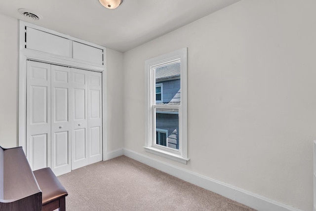 4904 25th Ave, Kenosha, WI 53140 - unfurnished bedroom with carpet and a closet