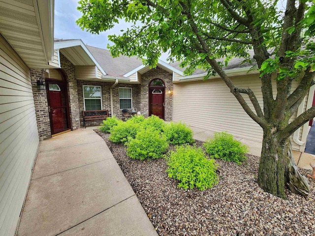 584 N Wisconsin St, Berlin, WI 54923 - entrance to property with brick siding and roof with shingles