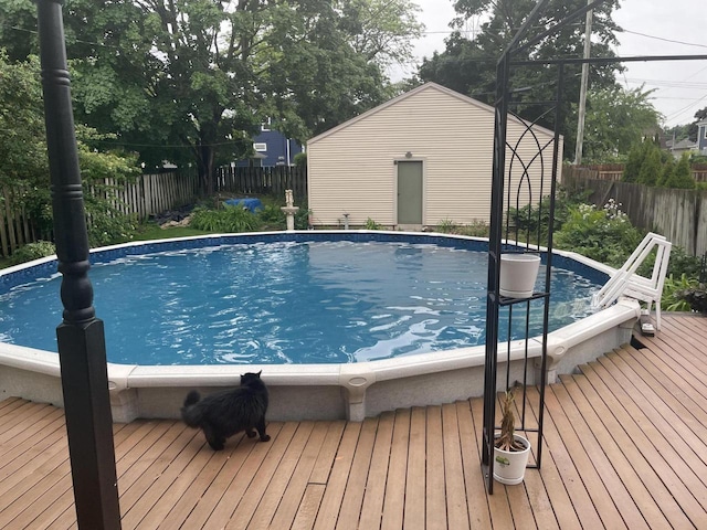 840 Lincoln Blvd, Manitowoc, WI 54220 - view of pool with a fenced backyard and a deck