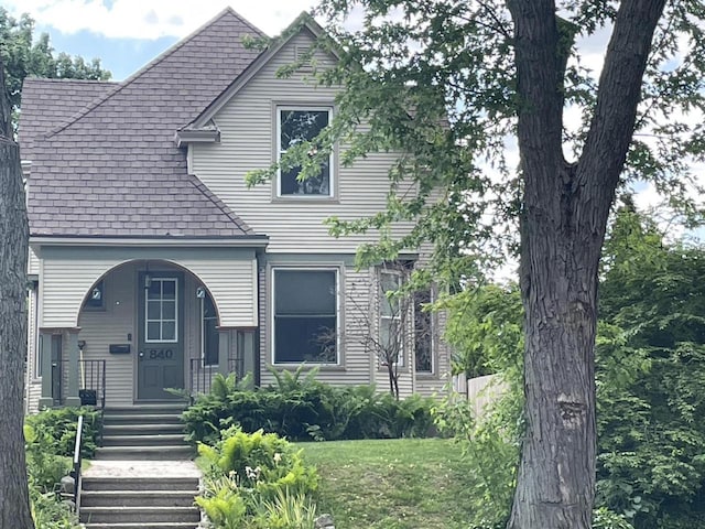 840 Lincoln Blvd, Manitowoc, WI 54220 - view of front of home with roof with shingles and covered porch