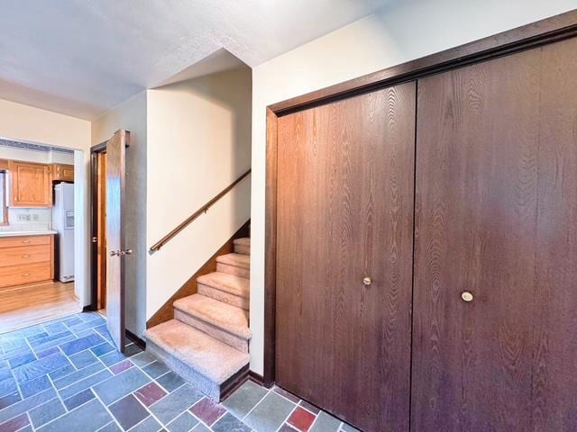 2709 Richard St, Marinette, WI 54143 - staircase featuring stone finish floors