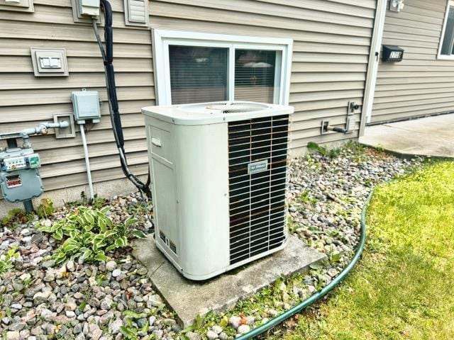 2709 Richard St, Marinette, WI 54143 - exterior view of a central air condition unit and gas meter