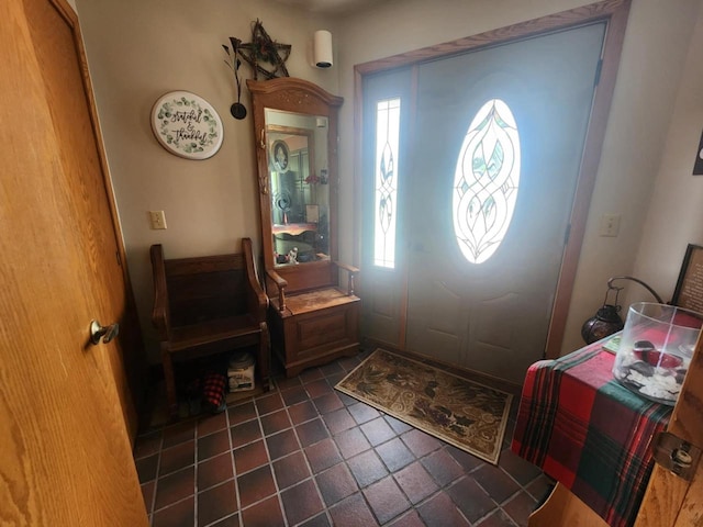 221 S Schmidt Ave, Marshfield, WI 54449 - foyer entrance featuring dark tile patterned flooring