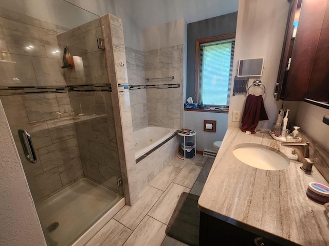 221 S Schmidt Ave, Marshfield, WI 54449 - bathroom featuring a stall shower, a tub with jets, and vanity