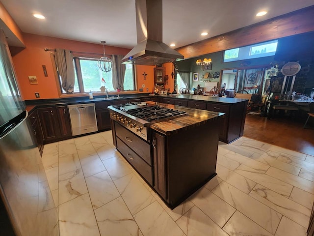 221 S Schmidt Ave, Marshfield, WI 54449 - kitchen featuring island exhaust hood, stainless steel appliances, dark countertops, light marble finish floors, and recessed lighting
