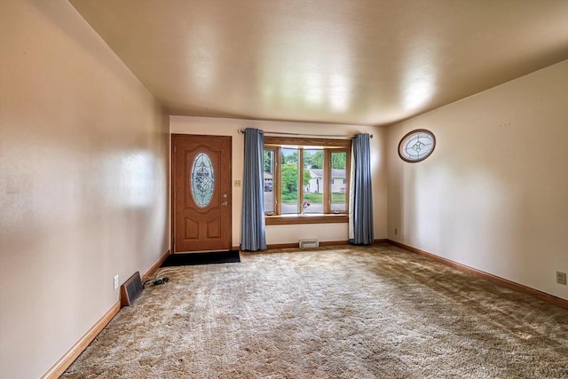 1981 Jan Ave, Waukesha, WI 53188 - foyer entrance featuring carpet floors and baseboards