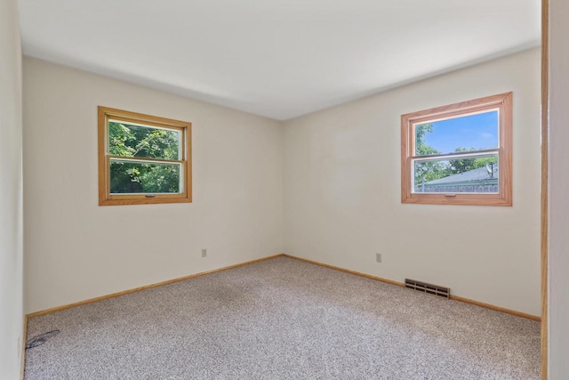 N94W17370 Erika Rd, Menomonee Falls, WI 53051 - carpeted spare room with baseboards