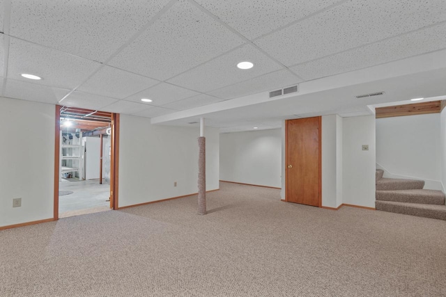 N94W17370 Erika Rd, Menomonee Falls, WI 53051 - finished basement featuring light carpet, stairway, recessed lighting, and a paneled ceiling