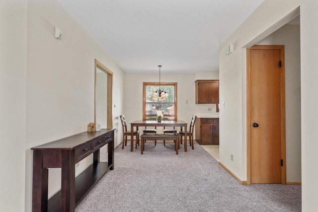 N94W17370 Erika Rd, Menomonee Falls, WI 53051 - dining room with light carpet and baseboards