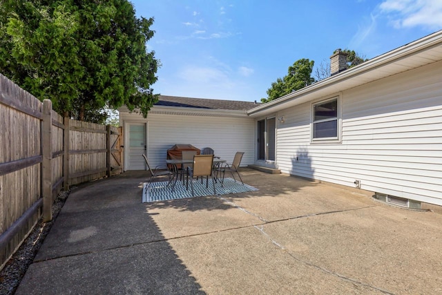 N94W17370 Erika Rd, Menomonee Falls, WI 53051 - fenced backyard featuring a patio area and outdoor dining area