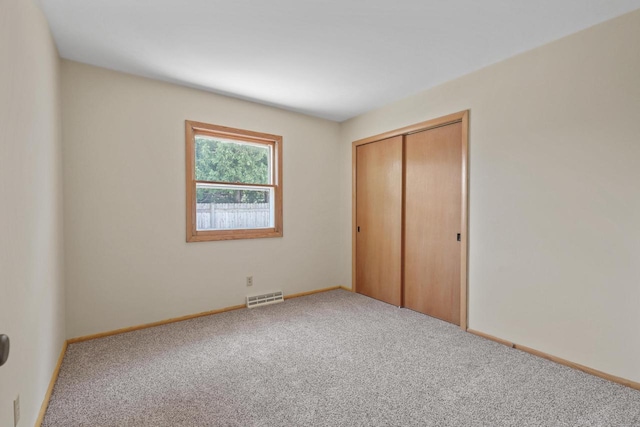 N94W17370 Erika Rd, Menomonee Falls, WI 53051 - unfurnished bedroom featuring carpet flooring and a closet