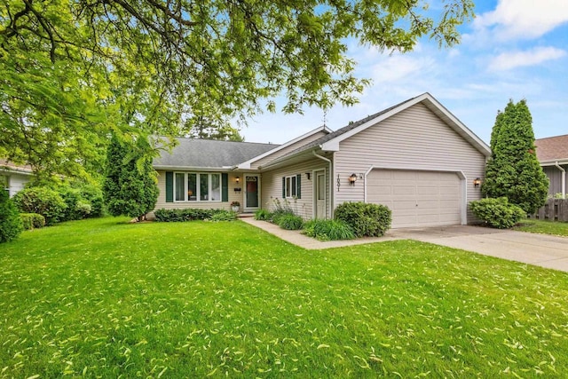1001 W Taylor St, Appleton, WI 54914 - single story home featuring an attached garage, concrete driveway, and a front lawn