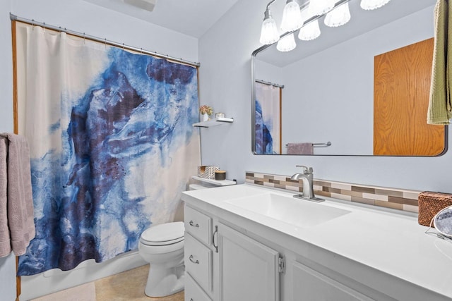 1001 W Taylor St, Appleton, WI 54914 - full bath with vanity, tasteful backsplash, tile patterned floors, and a shower with shower curtain