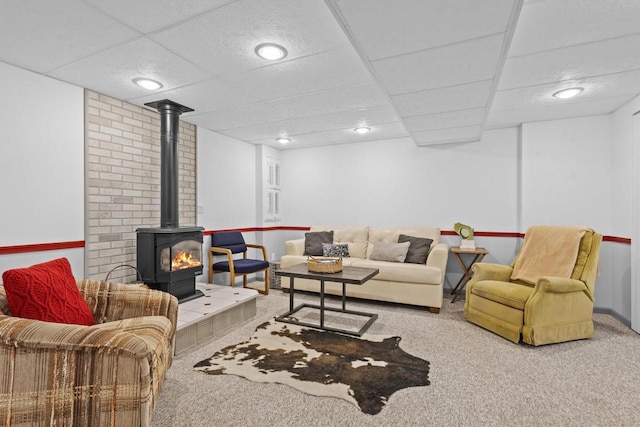 1001 W Taylor St, Appleton, WI 54914 - living room with carpet flooring, a wood stove, recessed lighting, and a drop ceiling