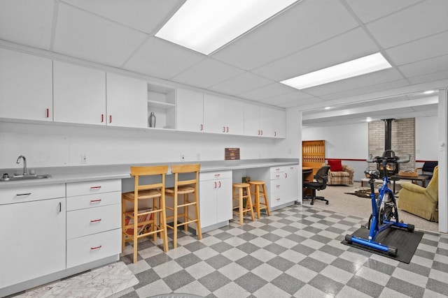 1001 W Taylor St, Appleton, WI 54914 - misc room with light flooring, built in desk, and a drop ceiling