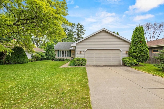 1001 W Taylor St, Appleton, WI 54914 - ranch-style home featuring a garage, concrete driveway, and a front yard