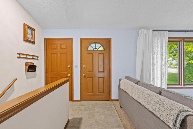 1001 W Taylor St, Appleton, WI 54914 - foyer entrance with healthy amount of natural light and a textured ceiling