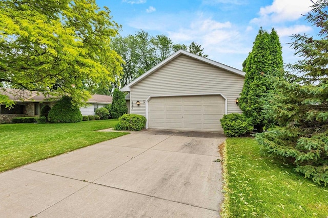 1001 W Taylor St, Appleton, WI 54914 - view of front facade featuring a garage and a front yard