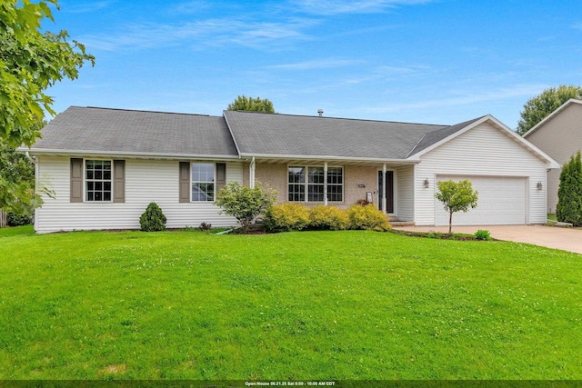 2847 Virgo Rd, Green Bay, WI 54311 - ranch-style home featuring a garage, driveway, and a front yard