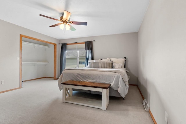2847 Virgo Rd, Green Bay, WI 54311 - bedroom featuring light carpet, a closet, and a ceiling fan