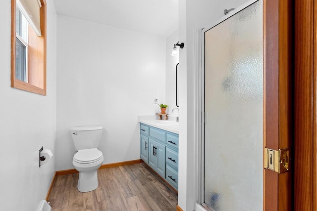 2847 Virgo Rd, Green Bay, WI 54311 - full bathroom with wood finished floors, vanity, and a shower stall