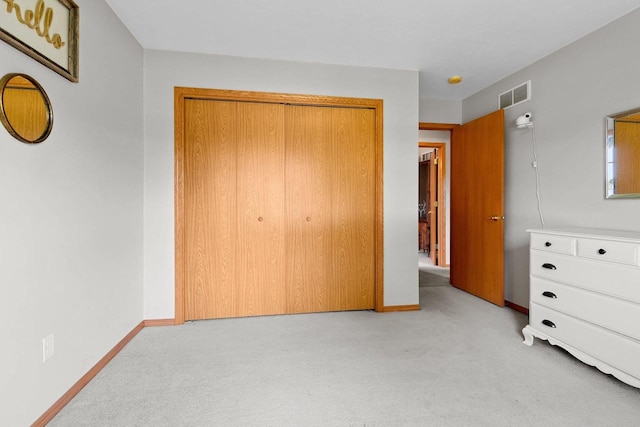 2847 Virgo Rd, Green Bay, WI 54311 - unfurnished bedroom with light carpet and a closet