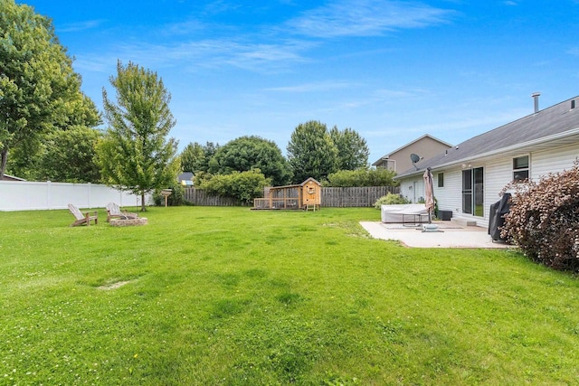 2847 Virgo Rd, Green Bay, WI 54311 - fenced backyard featuring a fire pit and a patio