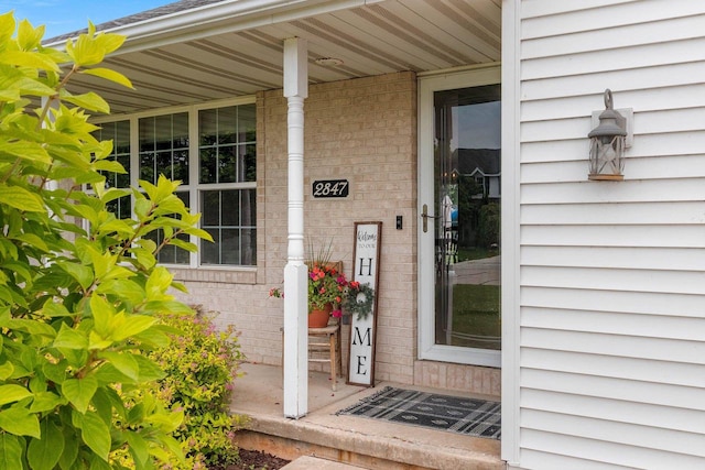 2847 Virgo Rd, Green Bay, WI 54311 - doorway to property featuring brick siding