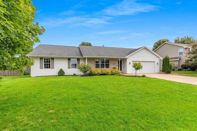 2847 Virgo Rd, Green Bay, WI 54311 - ranch-style home with driveway and an attached garage