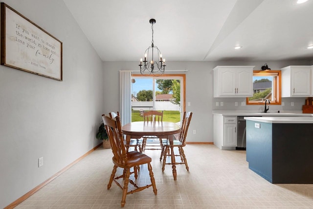 2847 Virgo Rd, Green Bay, WI 54311 - dining area with a chandelier, vaulted ceiling, light flooring, and recessed lighting