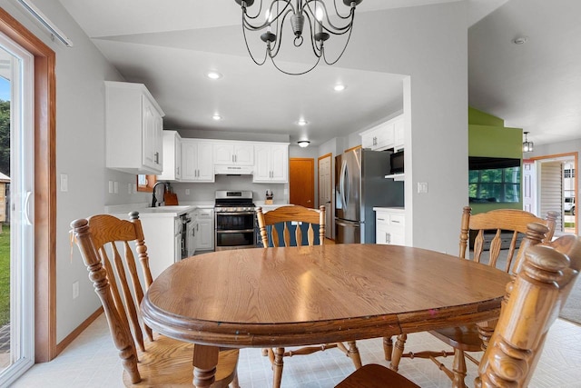 2847 Virgo Rd, Green Bay, WI 54311 - dining area featuring recessed lighting, a chandelier, light tile patterned floors, and vaulted ceiling