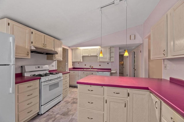 9315 N Shore Dr, Harshaw, WI 54529 - kitchen with white appliances, under cabinet range hood, a peninsula, vaulted ceiling, and hanging light fixtures