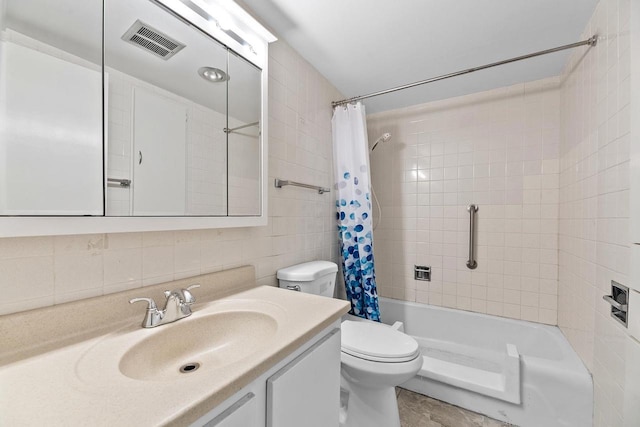 9315 N Shore Dr, Harshaw, WI 54529 - full bath featuring vanity, shower / bath combo with shower curtain, tile walls, and backsplash