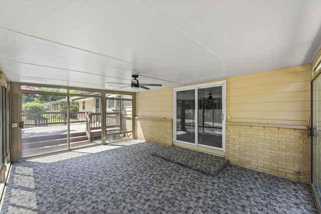 6101 W Edgerton Ave, Greendale, WI 53129 - unfurnished sunroom with a ceiling fan