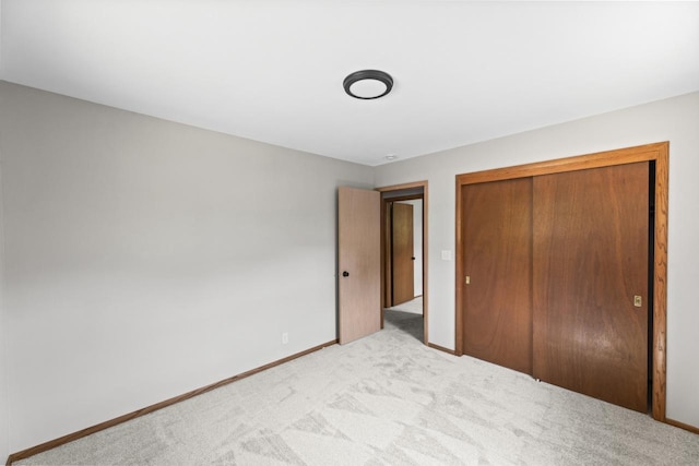 6101 W Edgerton Ave, Greendale, WI 53129 - unfurnished bedroom featuring carpet and a closet