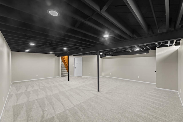 6101 W Edgerton Ave, Greendale, WI 53129 - finished below grade area featuring stairway and carpet flooring